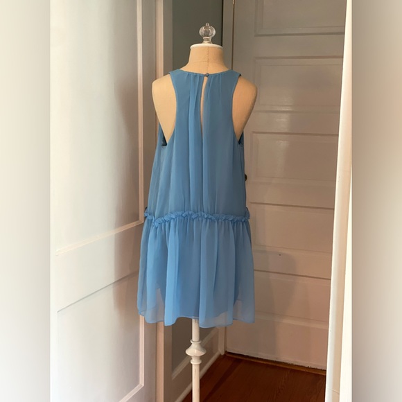 Likely brand mini dress. Drop waist, loose fit. Flirty and fun! Gently worn. - Picture 2 of 3